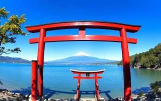 Panoramic view of Hakone showing Lake Ashi with Mount Fuji in the background, demonstrating why many consider Hakone worth visiting