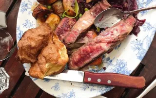 Explore traditional English foods that defy blandness with classic dishes like fish and chips and cottage pie.