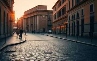 Early morning empty street in Rome with golden sunlight illuminating ancient buildings