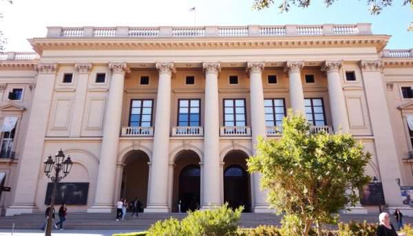 Exterior of the Prado Museum in Madrid with visitors entering the famous art gallery Exterior of the Prado Museum in Madrid with visitors entering the famous art gallery