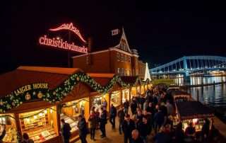 Christkindlmarkt Cincinnati market overview with festive lights, vendor booths, and holiday decorations