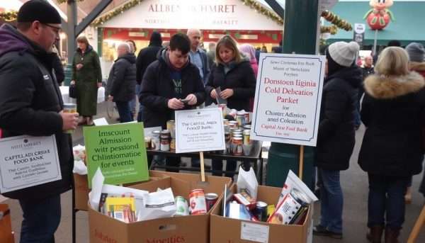 Food donation collection at the Dulles Expo Christmas Market for Capital Area Food Bank