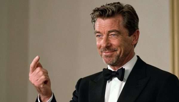 Pierce Brosnan as James Bond delivering a pun with a modern backdrop Pierce Brosnan as James Bond delivering a pun with a modern backdrop