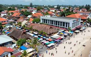 Aerial view of Kuta Bali shopping district showing markets and malls near the beach