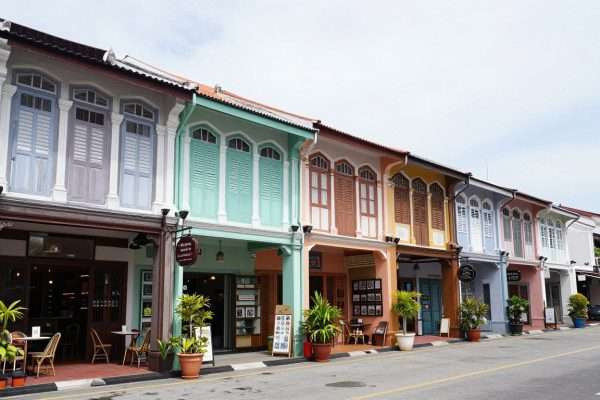 Colorful shophouses along the main street of Koh Lanta Old Town with small boutiques and cafes Colorful shophouses along the main street of Koh Lanta Old Town with small boutiques and cafes