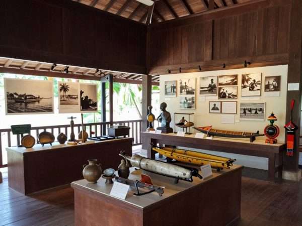 Interior of Koh Lanta Community Museum showing historical artifacts and displays about local culture Interior of Koh Lanta Community Museum showing historical artifacts and displays about local culture