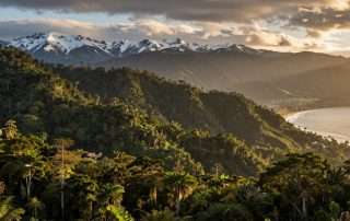 Panoramic view of Colombia's diverse landscapes showing mountains, forests and coastal areas representing the best natural wonders and national parks in Colombia