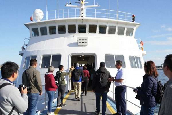 passengers boarding whale watching boat at long beach harbor
