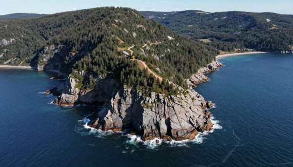 Cape Breton Highlands with coastal cliffs and ocean views Cape Breton Highlands with coastal cliffs and ocean views