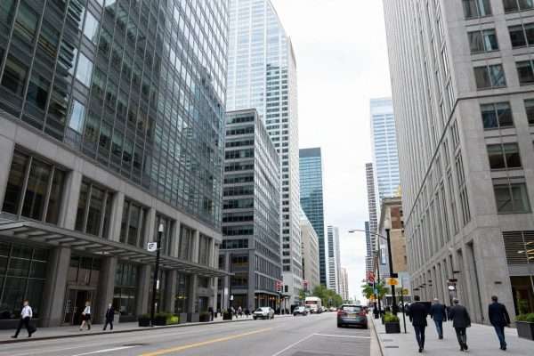 Downtown Toronto Financial District showing modern skyscrapers and busy streets Downtown Toronto Financial District showing modern skyscrapers and busy streets
