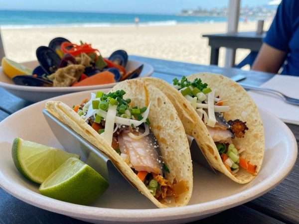 Fish tacos and seafood platter at beach restaurant Fish tacos and seafood platter at beach restaurant
