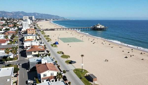 Hermosa Beach pier and coastline from aerial perspective Hermosa Beach pier and coastline from aerial perspective