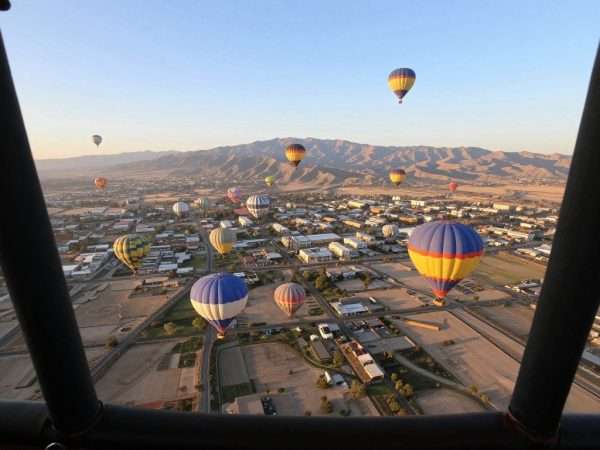 Hot air balloon ride over Rio Grande Valley with views of Albuquerque below Hot air balloon ride over Rio Grande Valley with views of Albuquerque below