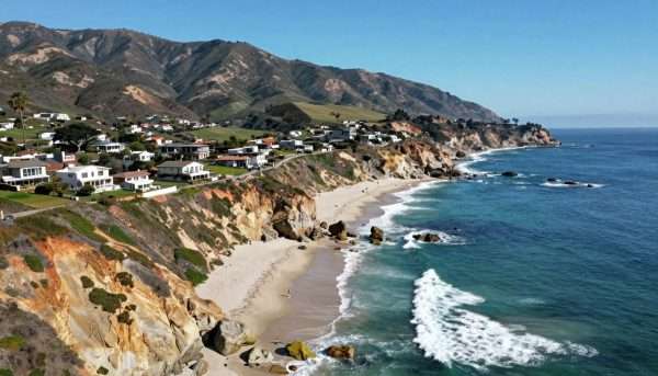Malibu coastline along Pacific Coast Highway with cliffs and ocean Malibu coastline along Pacific Coast Highway with cliffs and ocean