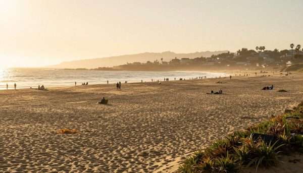 Peaceful fall beach scene with fewer crowds and beautiful light Peaceful fall beach scene with fewer crowds and beautiful light